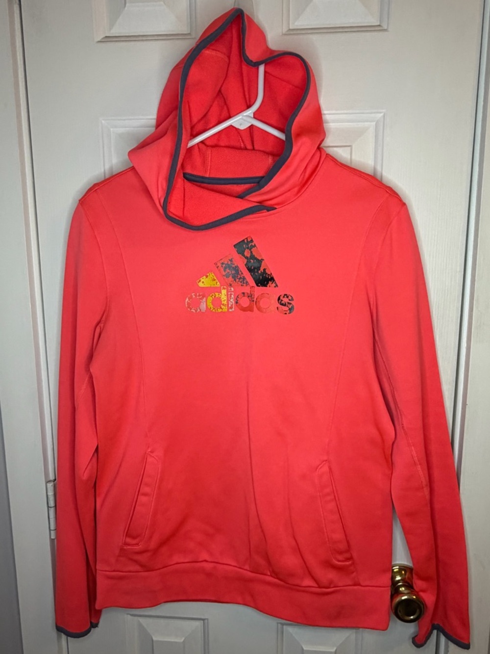 Adidas Women’s Coral Pink Hoodie with Logo, pockets and thumb holes